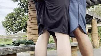 Hardcore outdoor pounding in public square with daring young guys ignoring passersby.