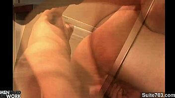 Long-haired gay guy blows bald man at work.