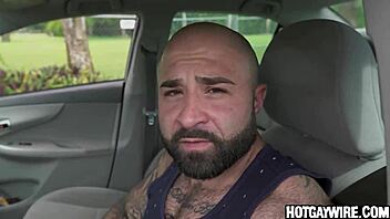 Surprised cop pulled over by muscular gay bodybuilder