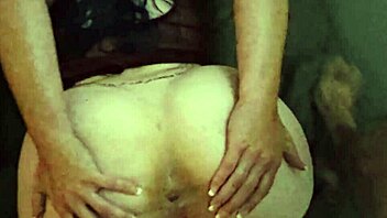 inserting new toy into tight rear, loving the sensation