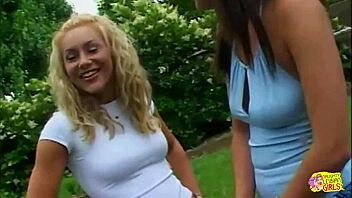 Her big nipples harden under lesbian touch. She pinches and cums hard outdoors with toys.