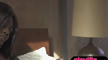 Petite black beauty strips naked to reveal her charms