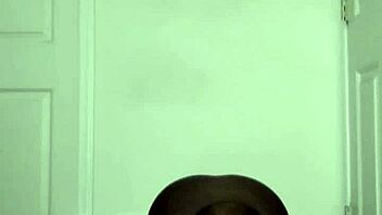 a woman prays facing forwards in a simple roleplay scene