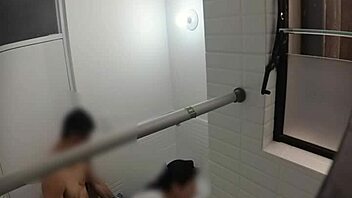Spying on Spanish teacher banging her lover in steamy bathroom action.