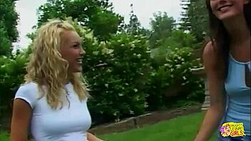 Her big nipples harden under lesbian touch. She pinches and cums hard outdoors with toys.