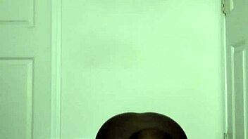 a woman prays facing forwards in a simple roleplay scene