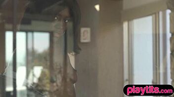 Petite black beauty strips naked to reveal her charms
