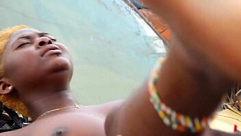 Public garage bang unfolds between mechanic and client. Their rough action on car hood shocks onlookers!