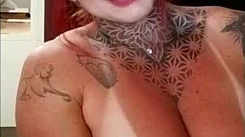 Redhead's Tan Lines and Big Tits in Sensual Display