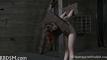 Bound slave endures rough cock drilling