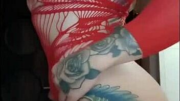 Redhead's Tan Lines and Big Tits in Sensual Display