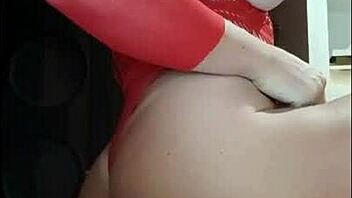 Redhead's Tan Lines and Big Tits in Sensual Display