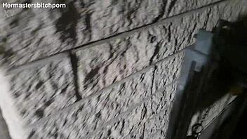 The tattooed milf slut gets pissed on publicly on the sidewalk while motorists yell.