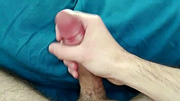 Young amateur masturbates to huge orgasm on bed