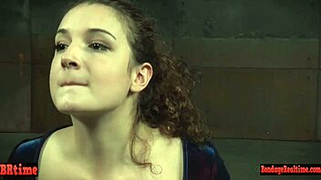 Submissive gets rough throat-fucked in a three woman bondage scene