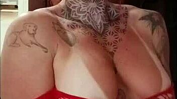 Redhead's Tan Lines and Big Tits in Sensual Display