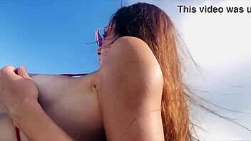 Italian MILF Artemisia shows off her big boobs in bikini