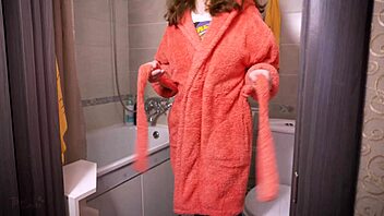 Hot milf in wet pantyhose teases her ass in the bathroom