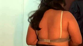 Asian cutie performs a strip tease and shows her body