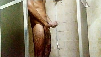 Taking a shower and masturbating to orgasm in the bathroom.