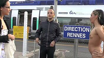Exhibitionists at the station lure a passenger for wild fun