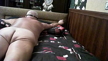 A couple’s intimate moment with spanking and anal sex