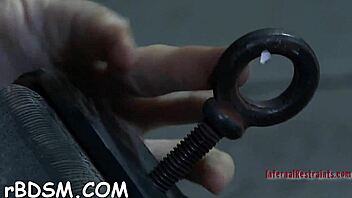 I watch the beauty get her cum-hole pleasured while she's locked in the cage