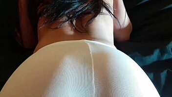 Beautiful brunette housewife in miniskirt and pantyhose tease