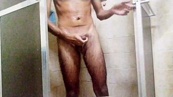 Taking a shower and masturbating to orgasm in the bathroom.