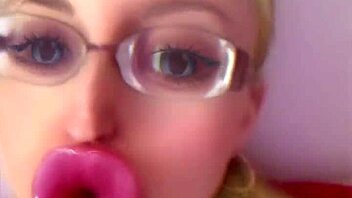 Bimbo doll transformation with huge pink lips and glasses