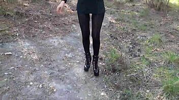 Beautiful brunette housewife in miniskirt and pantyhose tease