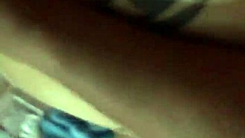 blonde with tattoo bends over in suggestive doggystyle pose