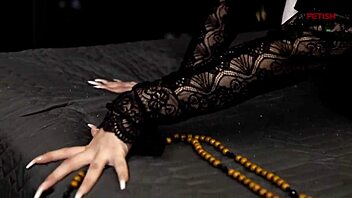 Freirinha Madalena poses in a stunning photo shoot with stockings and pierced nipples