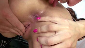 Brunette slut in fishnet fucked by huge cock