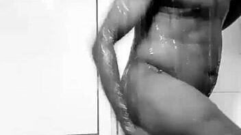 naija listens to neighbors moaning in bathroom.