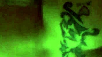 blonde with tattoo bends over in suggestive doggystyle pose