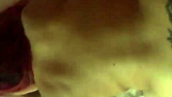 blonde with tattoo bends over in suggestive doggystyle pose