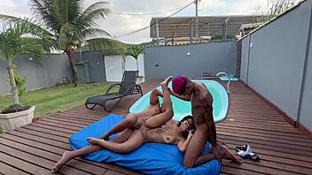 young latina with two in pool