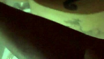 blonde with tattoo bends over in suggestive doggystyle pose