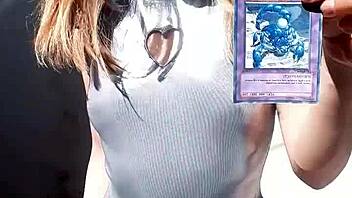 Bonneyuwu showcases her beautiful body in costumes while showing cards outdoors.