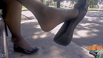 Hidden candid shoeplay featuring nylon stockings and flats