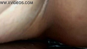 A young teen engages in doggystyle peeing while using a vaginal dilator, leading to a creampie finish in this amateur pornstar scene.