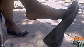 Hidden candid shoeplay featuring nylon stockings and flats