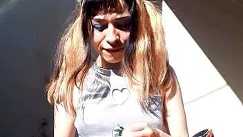 Bonneyuwu showcases her beautiful body in costumes while showing cards outdoors.