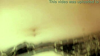 brunette milf mom fingers her pussy while bent over for anal