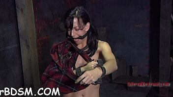 engulfing a hard toy one-eyed monster with brunette babe