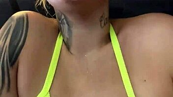 tanned babe in tiny bikini gets wet at Copacabana gym