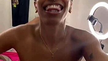 Petite 18+ blonde gives sloppy blowjob to big black cock.