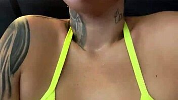 tanned babe in tiny bikini gets wet at Copacabana gym