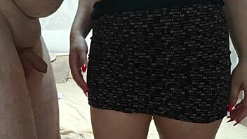 an old man and young girl give handjob and blowjob ending in cumshot.